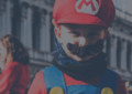 a little boy wearing Super Mario Costume